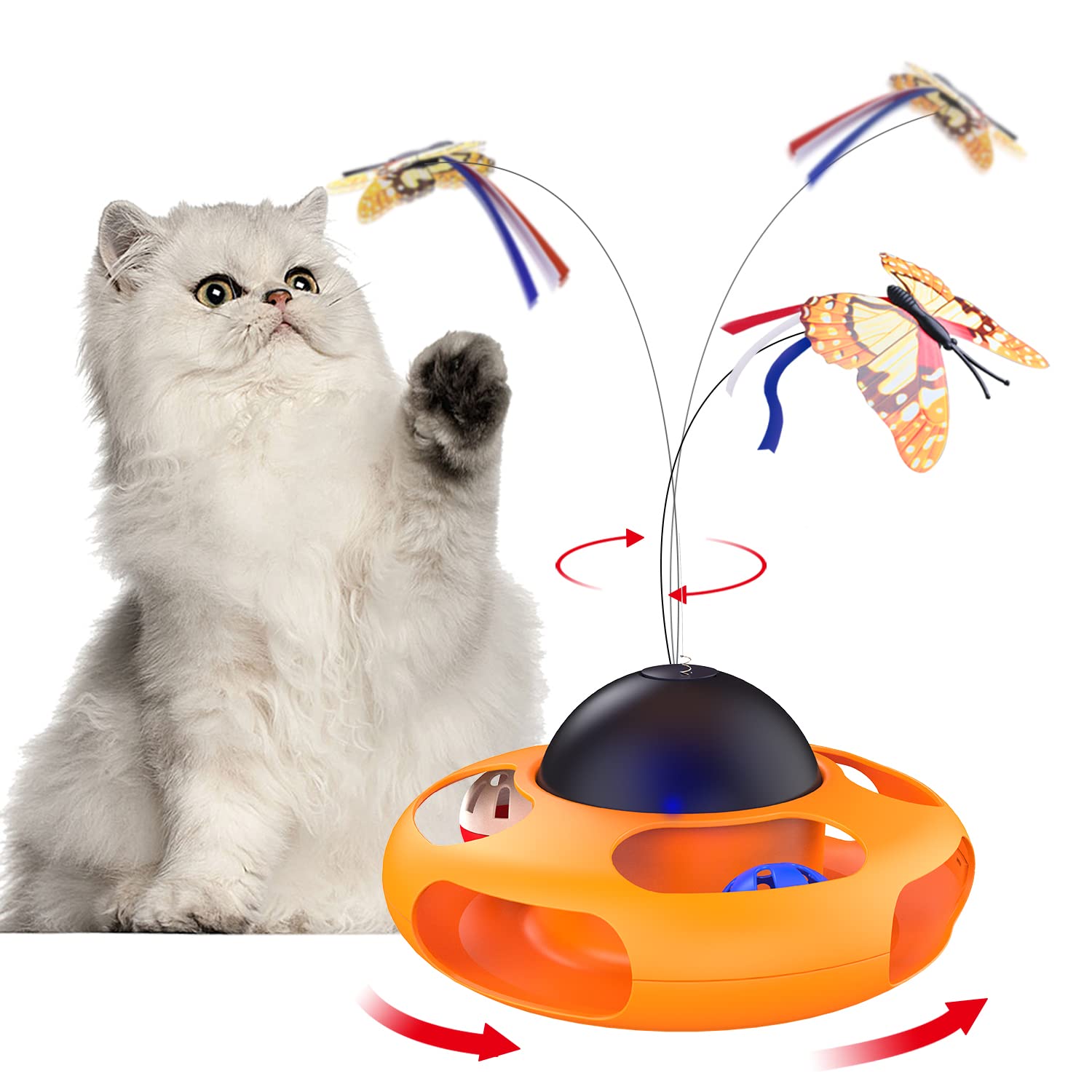 orange kitten playing energetically with interactive cat toy