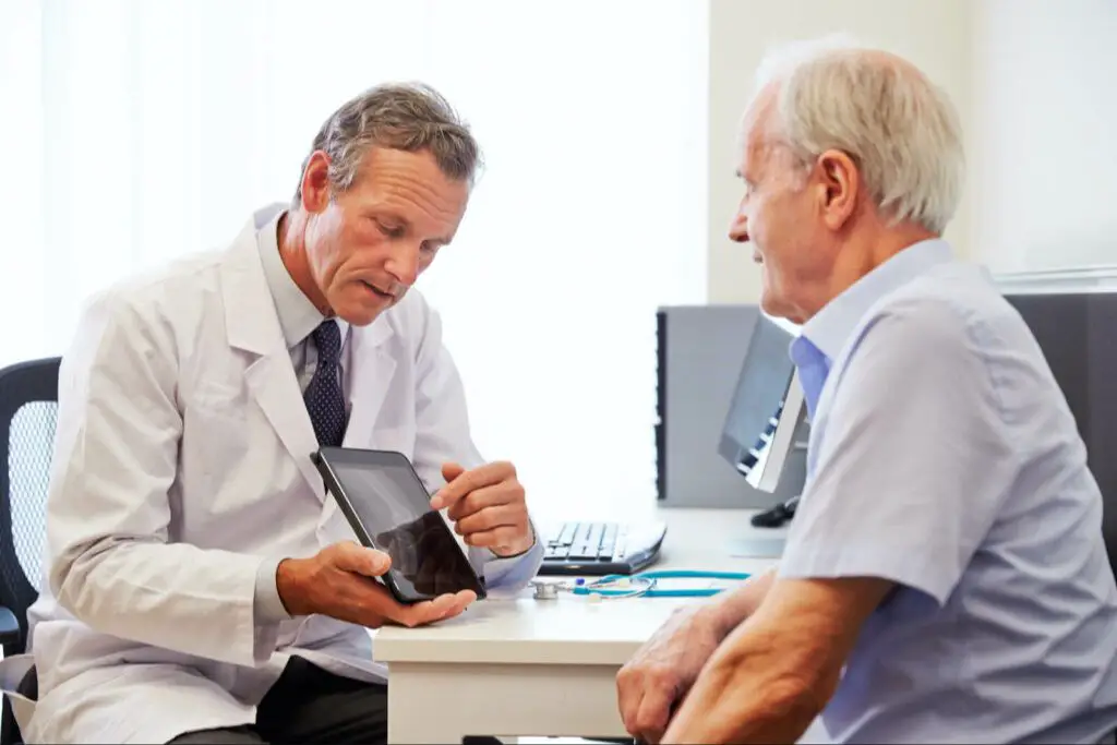 doctor discussing iol options with a senior patient
